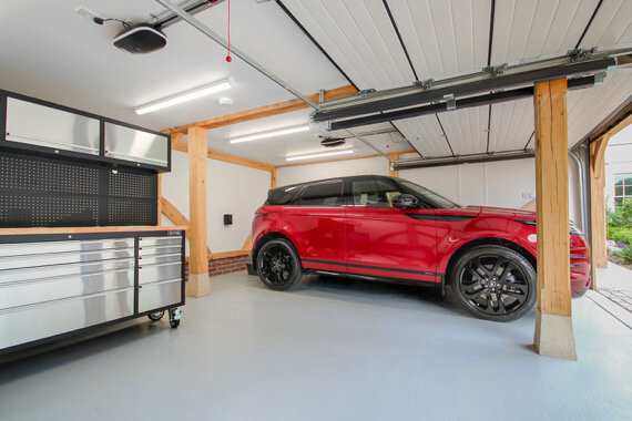 Oak Garage With Automated Roller Doors